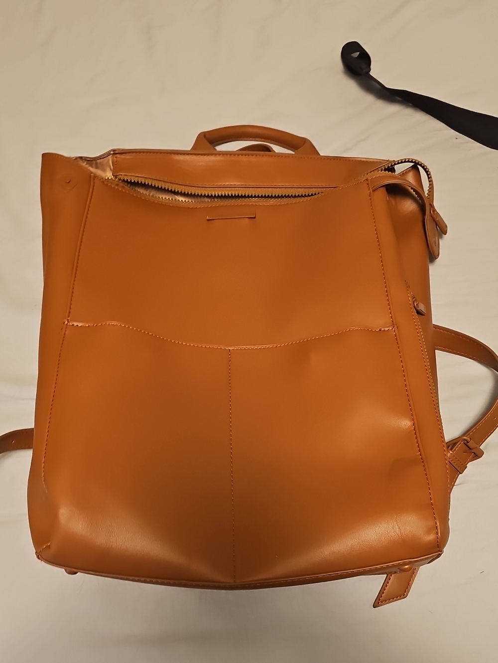 Minimalist Tan Leather Backpack Traveling